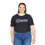 Woman wearing a black t-shirt with the text 'Murder Shows & Comfy Clothes' and a playful graphic design.