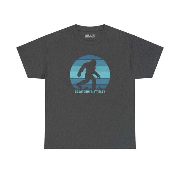 Squatchin' Ain't Easy athletic tee with Bigfoot silhouette graphic, perfect for Sasquatch hunting fans and Northwest legends enthusiasts.