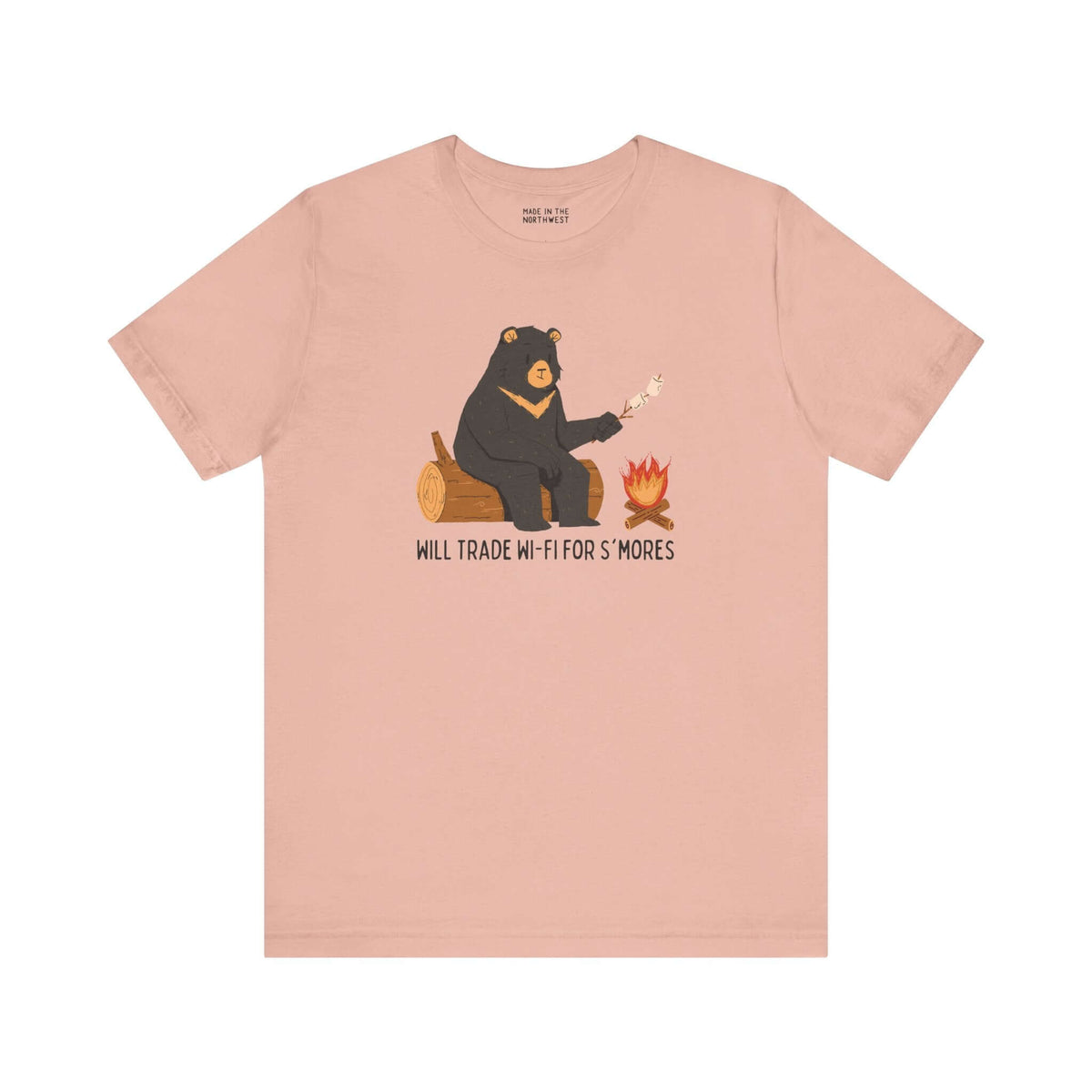 Pink tee with bear roasting marshmallows by campfire, text reads 'Will Trade Wi-Fi for S'mores', perfect for outdoor lovers.