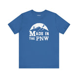 Made in the PNW T shirt in blue with a distressed mountain graphic design.