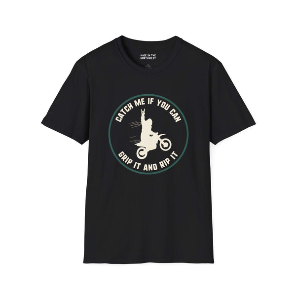 Black motocross t-shirt with "Catch Me If You Can" design featuring Bigfoot on a dirt bike, ideal for thrill-seekers.