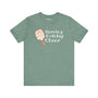 Serving Holiday Cheer Pickleball T Shirt featuring a festive paddle design and playful text.