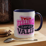 Your Feelings Are Valid Mug with colorful text design and navy handle, perfect for coffee or tea.