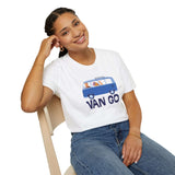 Woman wearing a Vincent in a Van Go Softstyle T-Shirt with a VW van graphic, showcasing art and wanderlust.