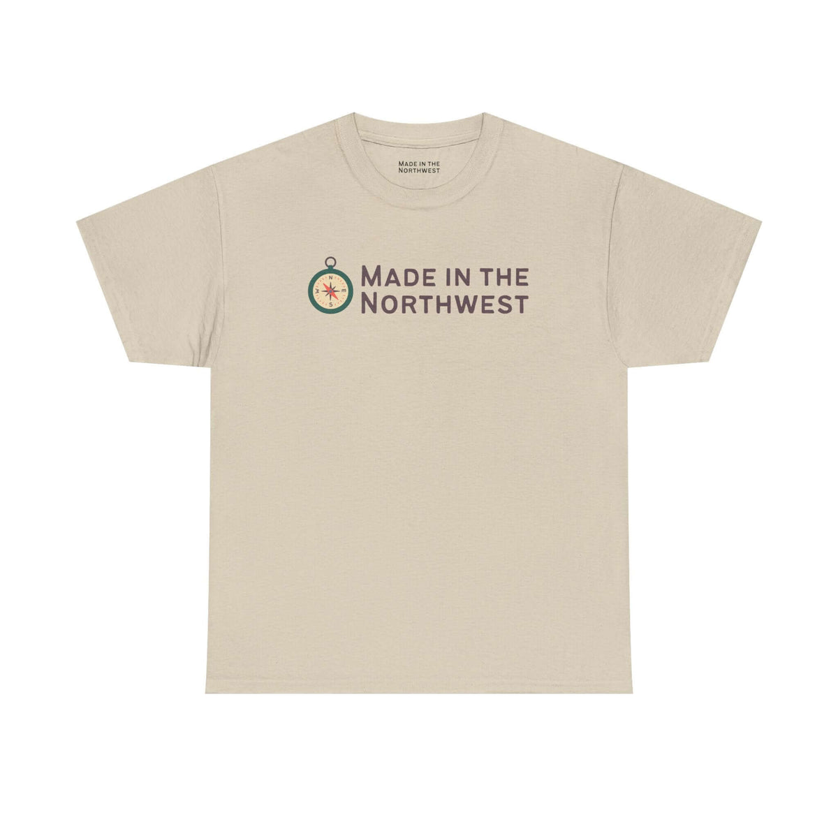 Made in the Northwest T Shirt featuring a compass logo on a light beige shirt.