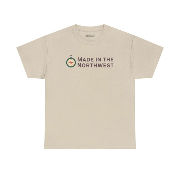 Made in the Northwest T Shirt featuring a compass logo on a light beige shirt.