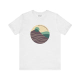 Pacific Peaks Modern Circle Soft Tee with mountain design in muted colors, perfect for outdoor enthusiasts showing love for the Northwest.