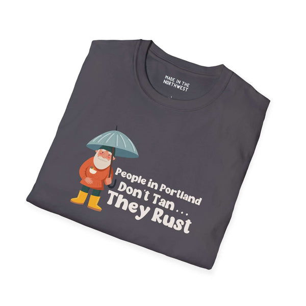 People in Portland Don't Tan, They Rust graphic t-shirt featuring a bear with an umbrella on gray fabric.