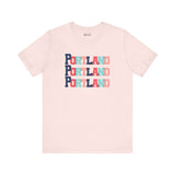 Bold Portland trio soft tee with colorful block-letter design, celebrating Portland in vibrant style. Perfect for Rose City fans.