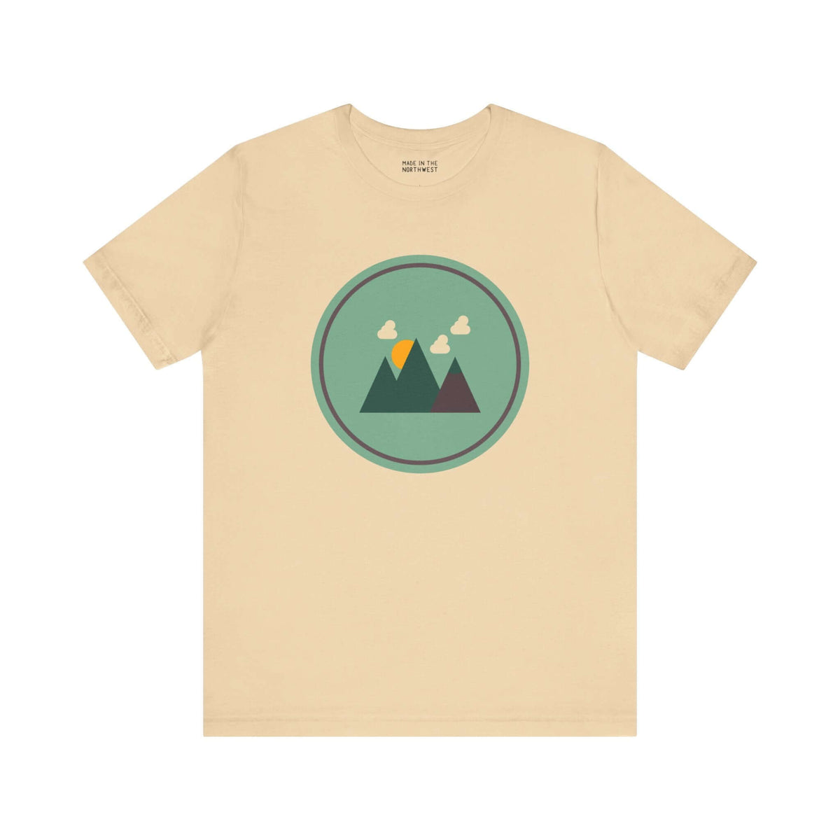 Beige minimalist forest tee with mountain design, inspired by Pacific Northwest style, featuring simple geometric shapes.