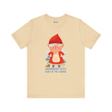 Gnomebody Puts Baby in the Corner tee featuring a whimsical gnome design on a beige shirt.