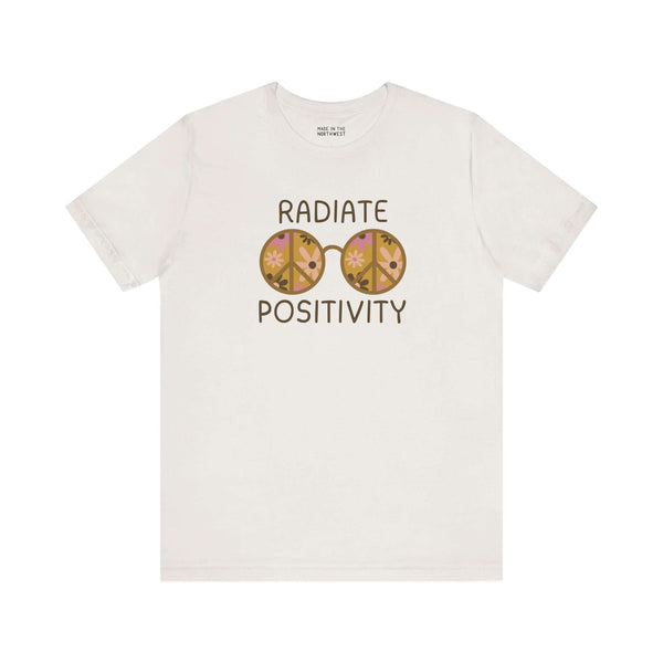 Radiate Positivity soft tee with vibrant floral glasses design, perfect for free spirits and optimists.