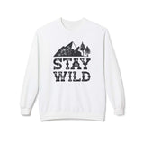 Stay Wild sweatshirt featuring a vintage mountain and trees graphic on a white crewneck.