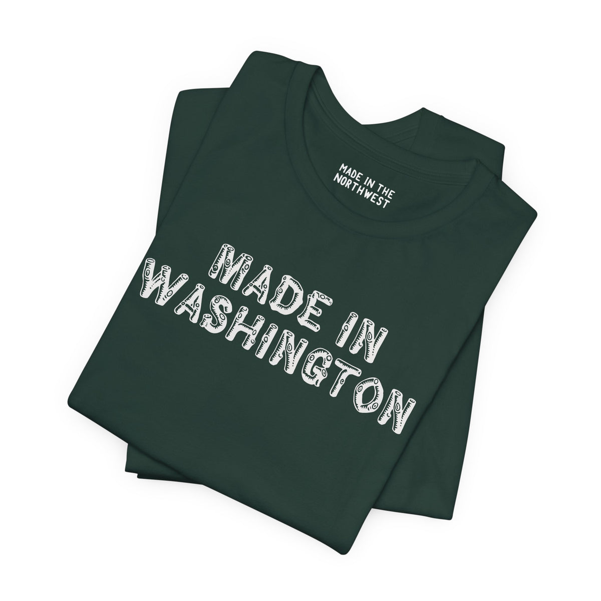 Premium soft tee in dark green featuring 'Made in Washington' log font, ideal for Pacific Northwest pride.