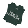 Premium soft tee in dark green featuring 'Made in Washington' log font, ideal for Pacific Northwest pride.