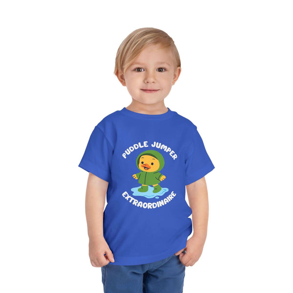 Puddle Jumper Extraordinaire Toddler Tee featuring a cheerful duck in a green raincoat, perfect for rainy days.