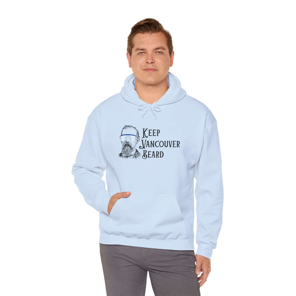 Man wearing a light blue Keep Vancouver Beard hoodie with a vintage bearded icon.