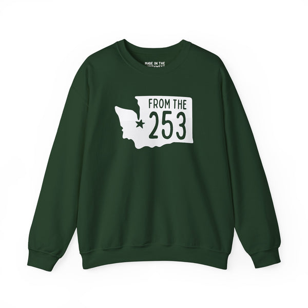 Green sweatshirt featuring Washington state silhouette and 'From the 253' text, celebrating Tacoma pride.