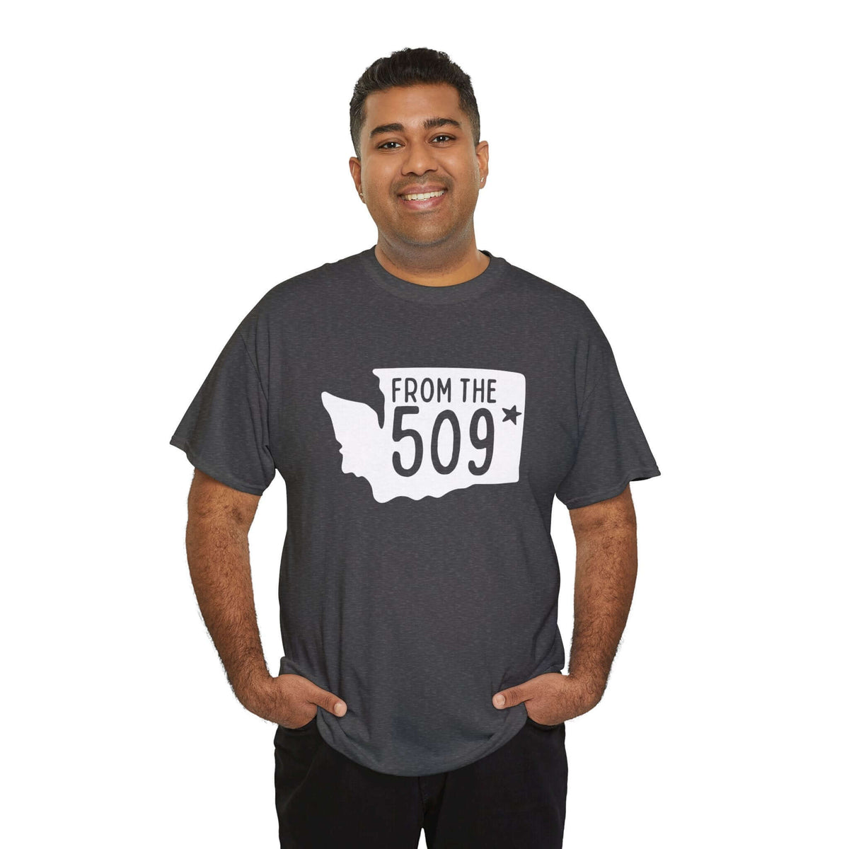 Man wearing "From the 509" tee with Washington silhouette, Spokane star marking, on dark background representing local pride.