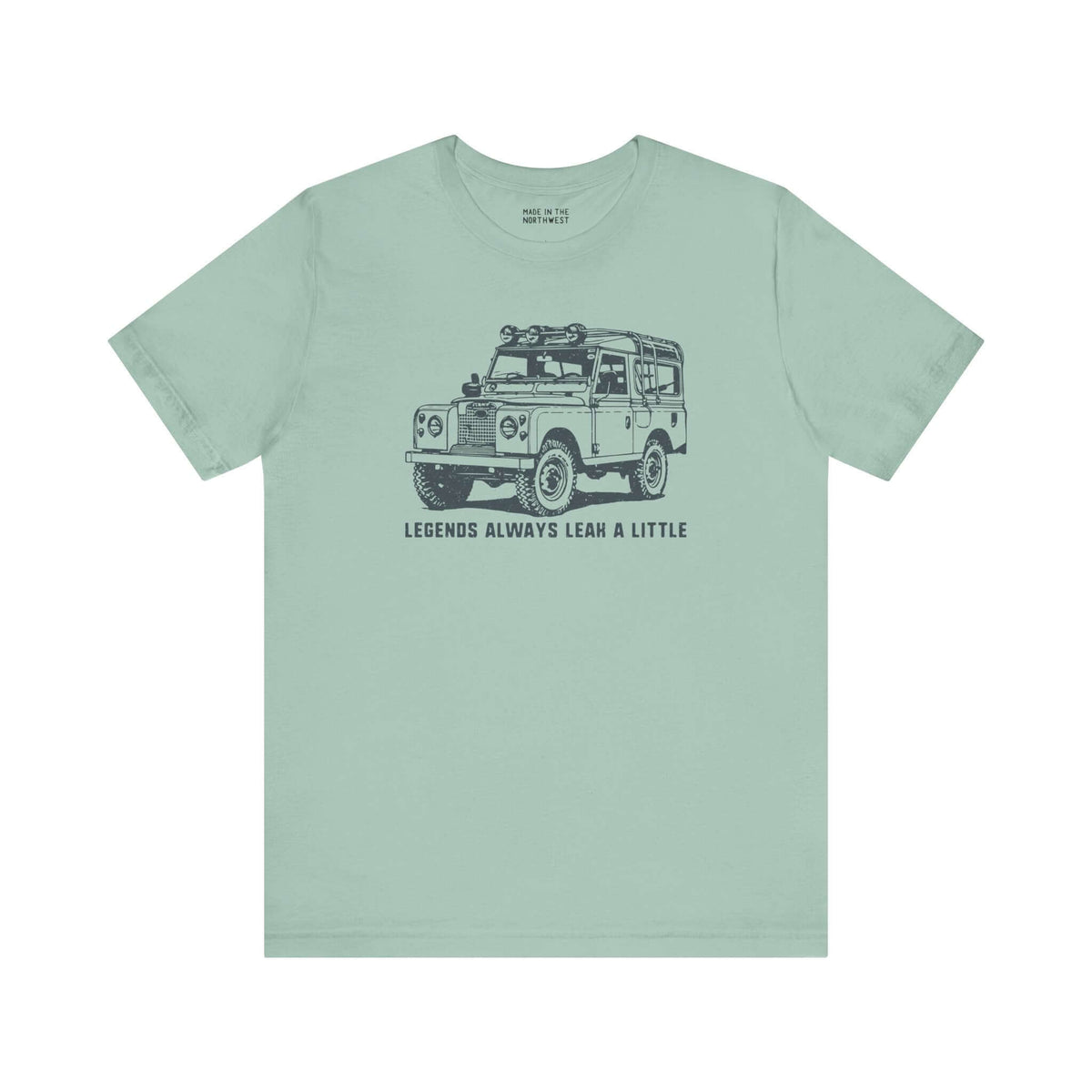 Legends Always Leak a Little premium soft tee featuring Land Rover Series II graphic on a mint green shirt.
