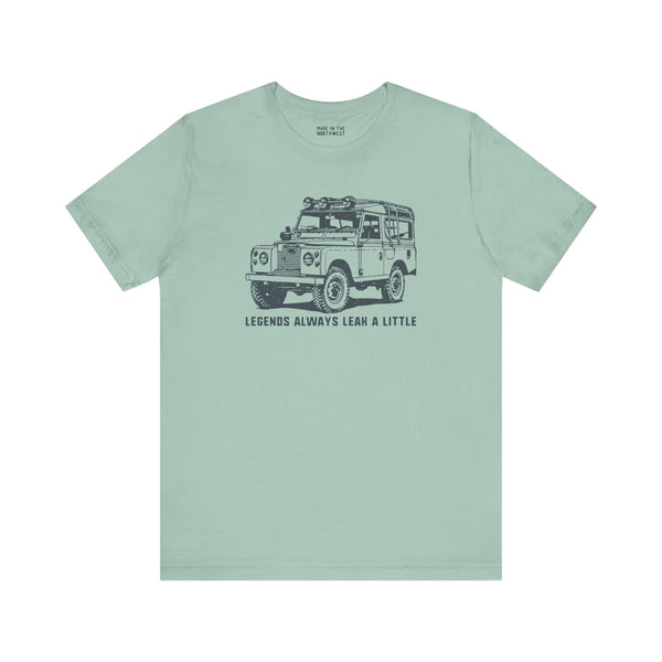 Legends Always Leak a Little premium soft tee featuring Land Rover Series II graphic on a mint green shirt.