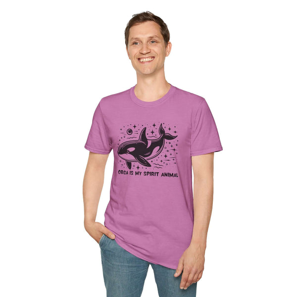 Man wearing a purple Orca Is My Spirit Animal Softstyle T-Shirt featuring orcas and ocean stars design.