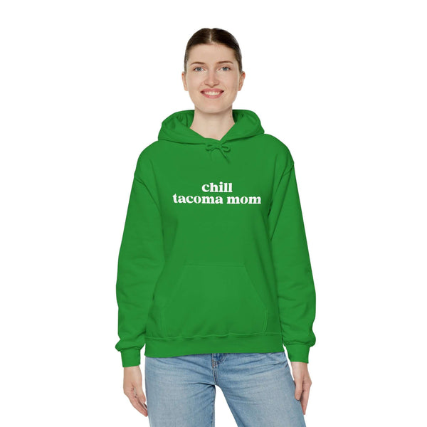 Green hoodie featuring "chill tacoma mom" text, perfect for cozy, stylish moms in Tacoma.