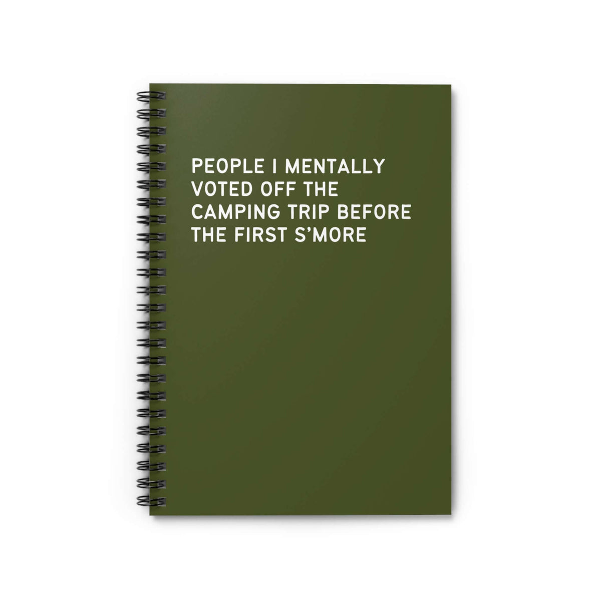 Spiral notebook with green cover and text: People I Mentally Voted Off the Camping Trip Before the First S'more.