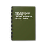 Spiral notebook with green cover and text: People I Mentally Voted Off the Camping Trip Before the First S'more.