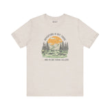 Premium soft tee with outdoor graphic and text 'Adventure Is Out There... And So Are Serial Killers'.