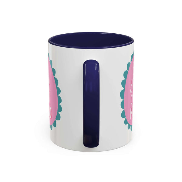 Be Your Own Hero Mug with pink badge and teal scallops, perfect for morning coffee or tea.