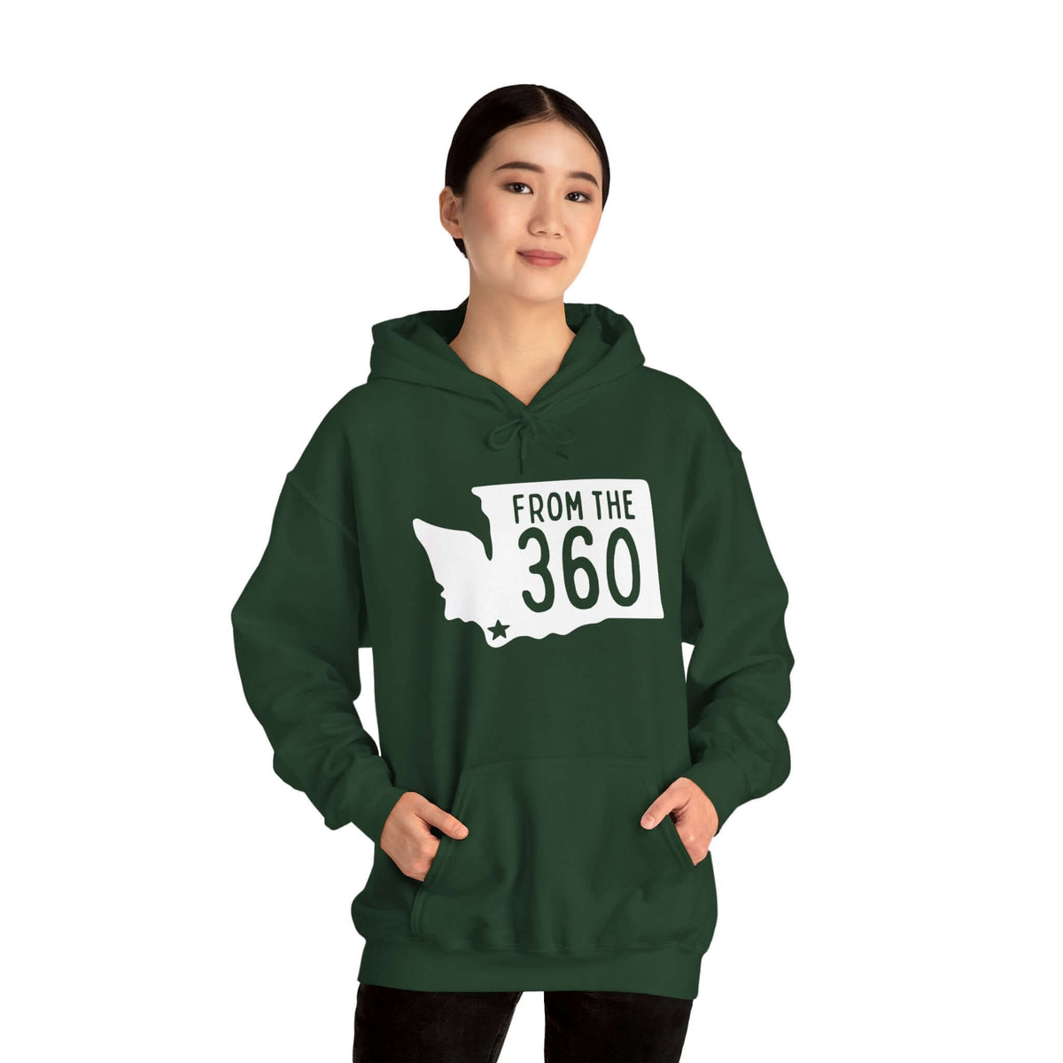 Model wearing a green hoodie featuring a Washington state silhouette and text 'From the 360', perfect for local pride.