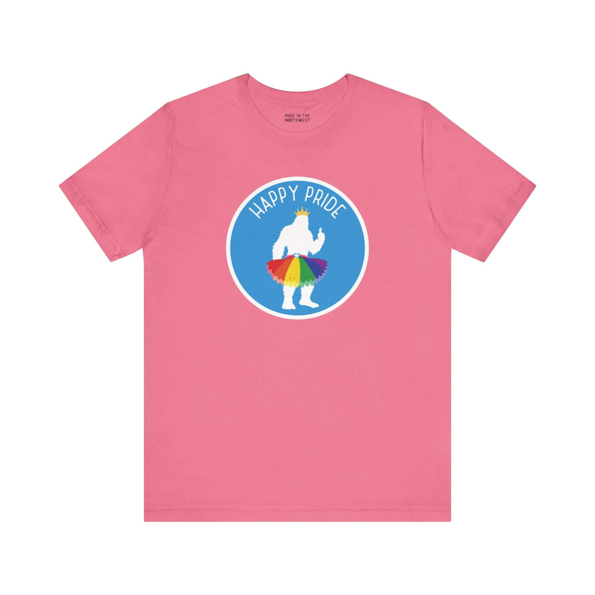 Pink tee featuring a silhouette of Bigfoot in a rainbow tutu with "Happy Pride" text, celebrating Pride spirit and fun.