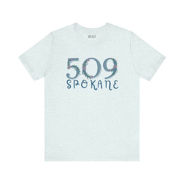 Light green 509 floral area code soft tee with Spokane print for Pacific Northwest style.