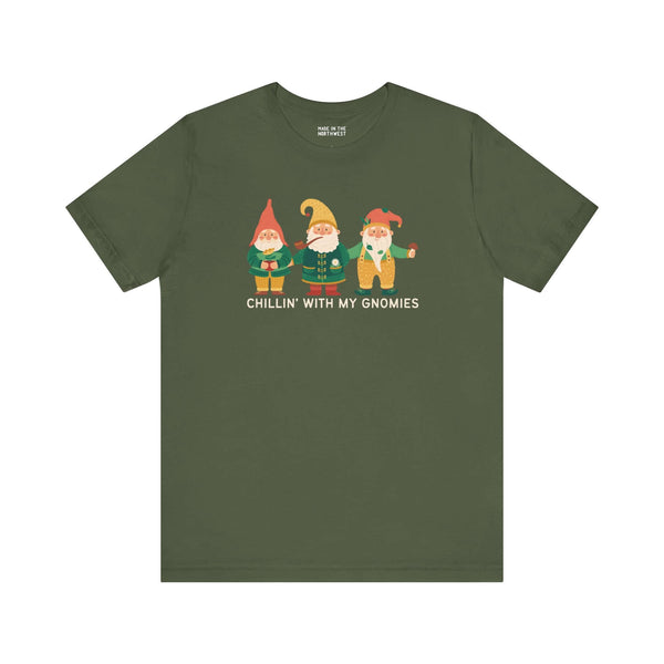 Chillin' with My Gnomies premium soft tee featuring whimsical garden gnomes and a fun message on an olive green shirt.