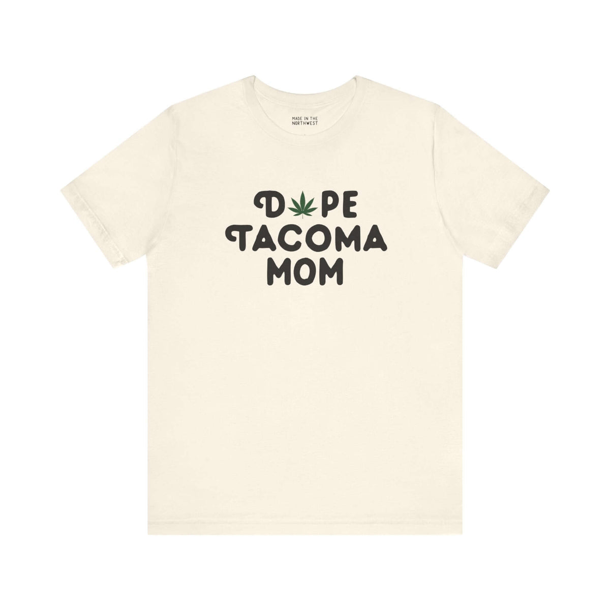 Off-white "Dope Tacoma Mom" tee featuring a playful marijuana leaf design, perfect for cool moms embracing the Tacoma style.