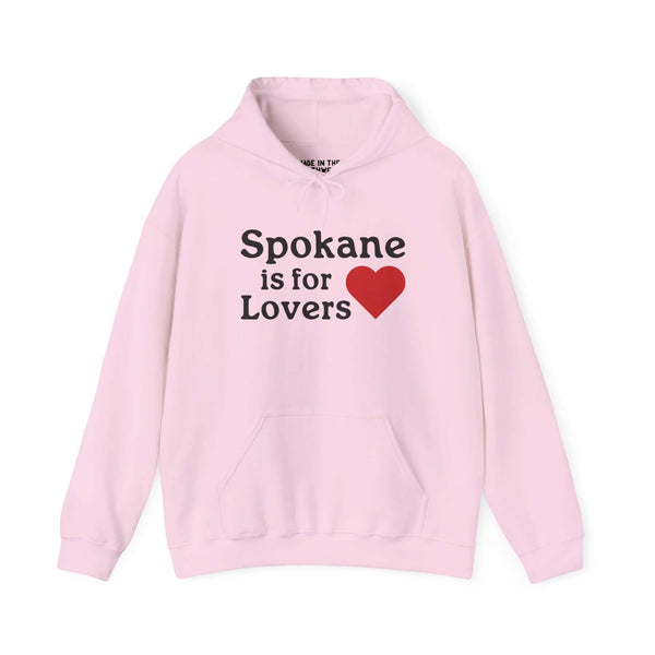 Pink "Spokane is for Lovers" hoodie with a heart symbol, celebrating the beauty and spirit of Spokane.