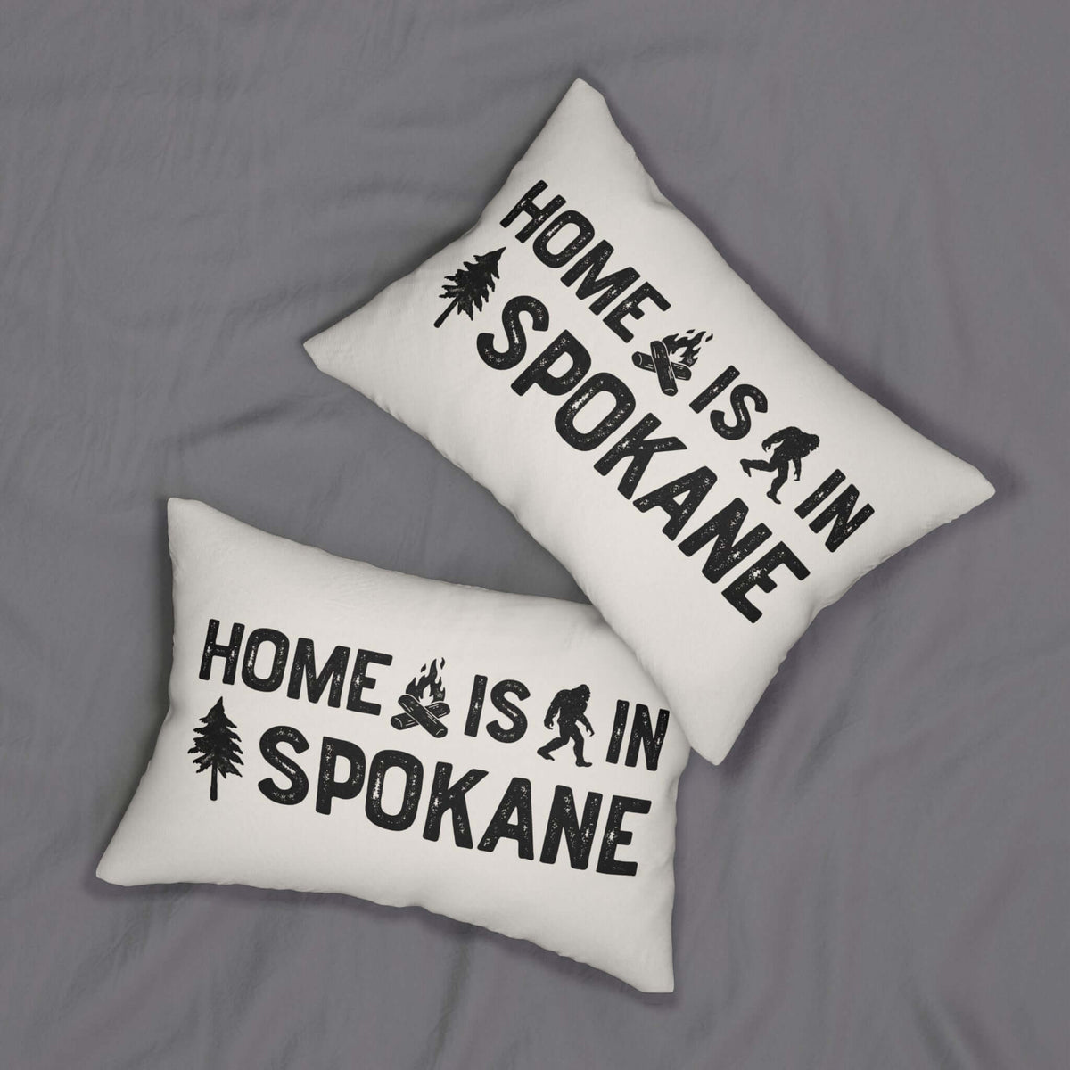 Home is in Spokane Lumbar Accent Pillow featuring bold black text and cozy design on two pillows.