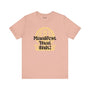 Manifest That Shit premium soft tee in blush color, featuring a powerful goal-setting design.