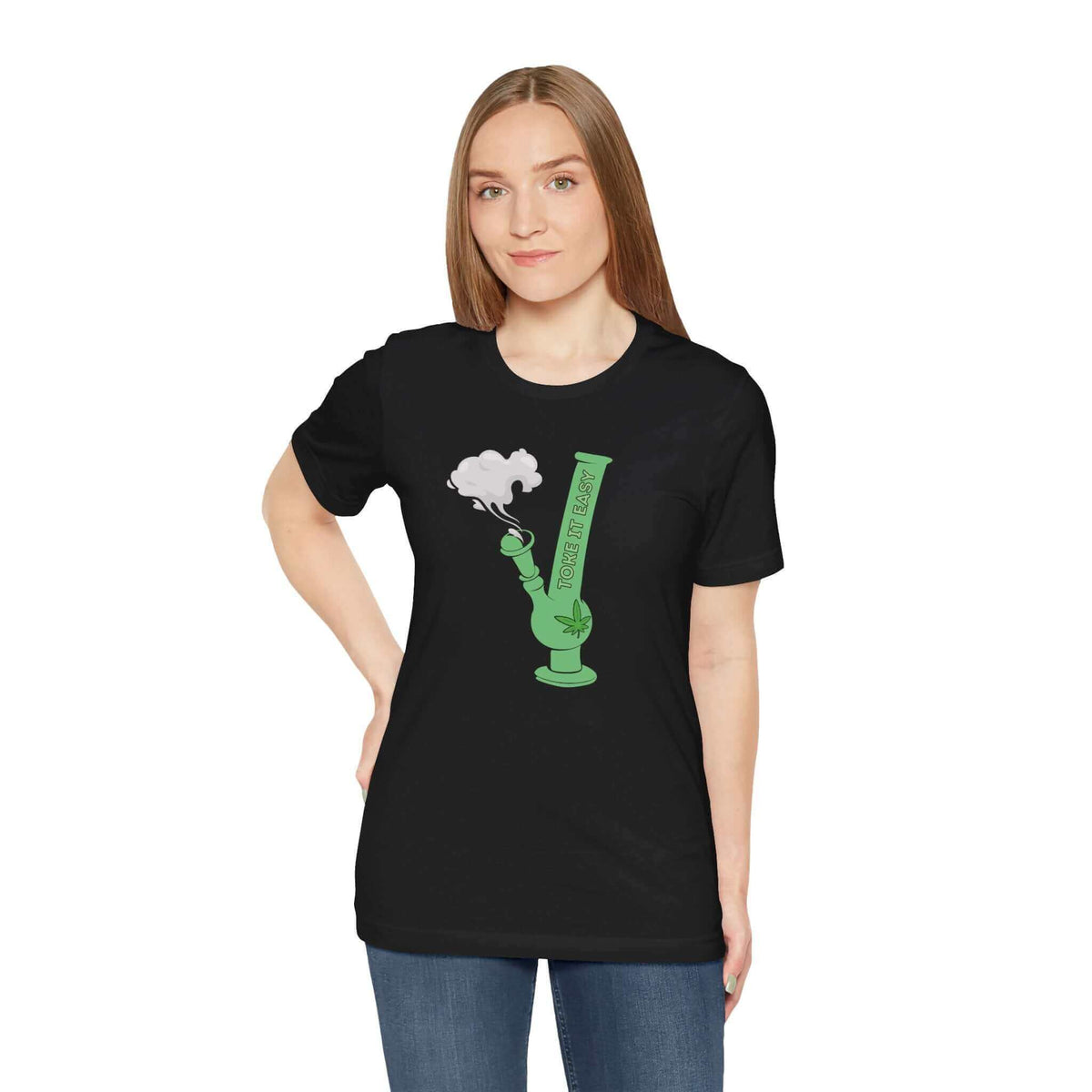 Woman wearing a "Toke It Easy" tee with green bong graphic, celebrating cannabis culture and PNW spirit.