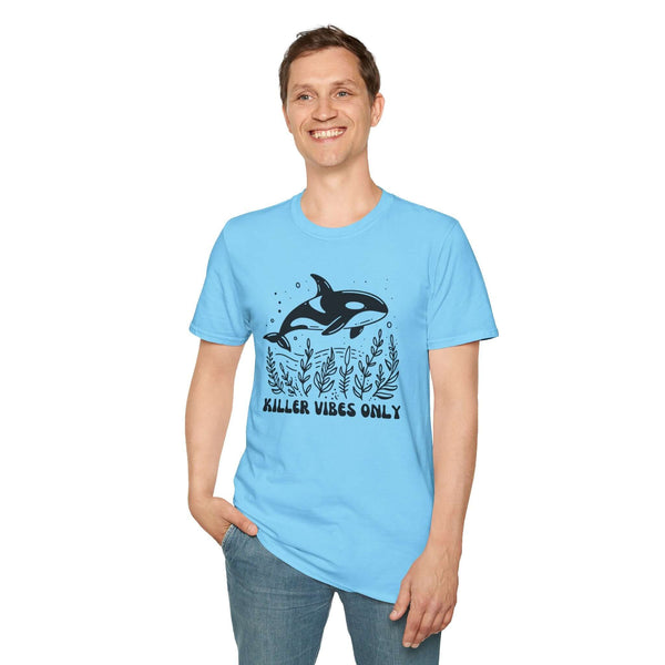 Model wearing a blue Killer Vibes Only Orca Whale T-shirt, showcasing a bold orca graphic and ocean-inspired design.