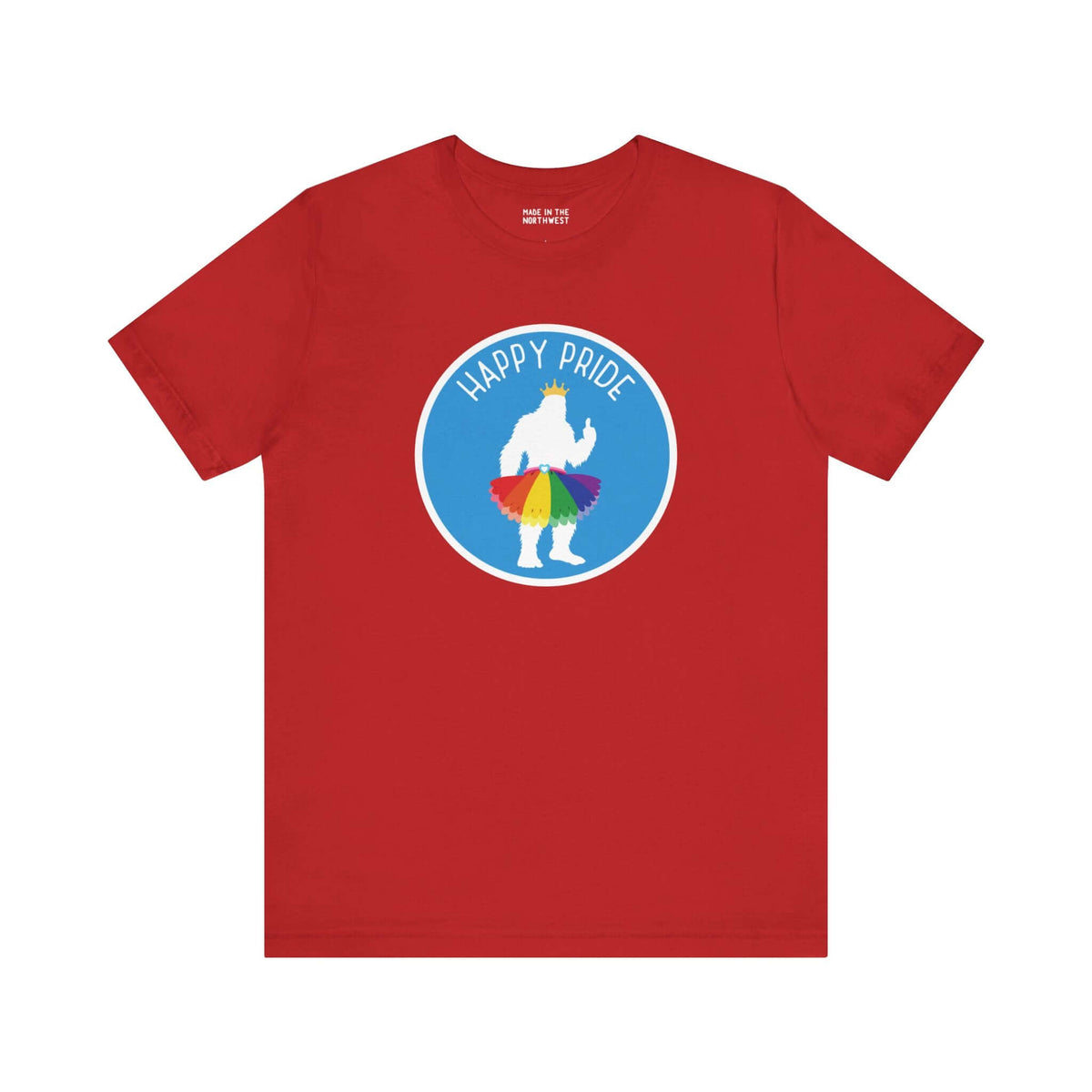 Red tee with Bigfoot silhouette in rainbow tutu, crown, and 'Happy Pride' text, celebrating Pride spirit.