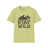 Stay Wild T Shirt featuring outdoor mountain and tree design on a light green background.