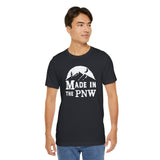 Made in the PNW T Shirt – Distressed Mountain Graphic Tee worn by a model, showcasing the nighttime mountain design.