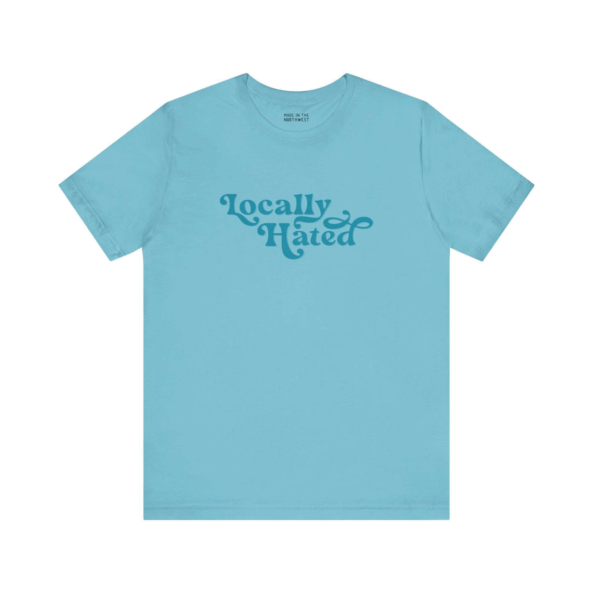 Light blue "Locally Hated" tee with bold cursive font, designed for a striking statement in the Pacific Northwest.