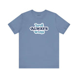 love always wins t shirt in blue featuring bold, colorful typography celebrating love for Pride.