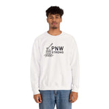 PNW Strong Crewneck Sweatshirt featuring a bold axe-in-stump graphic worn by a model