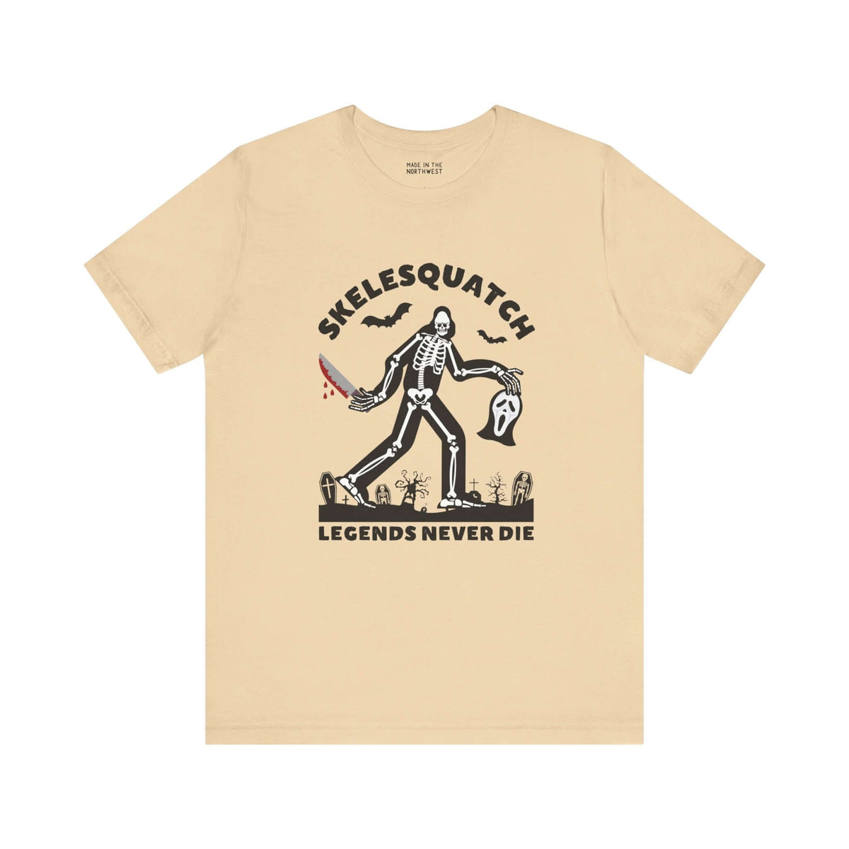 Skelesquatch Halloween t-shirt with skeleton sasquatch, bloody knife, and Scream mask in graveyard design. Legends Never Die print.