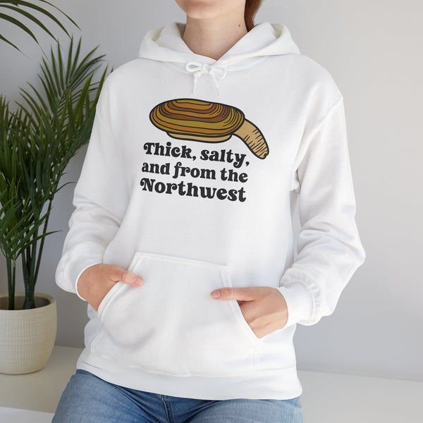 Person wearing a white hoodie featuring a geoduck clam graphic and 'Thick, Salty, and from the Northwest' text.
