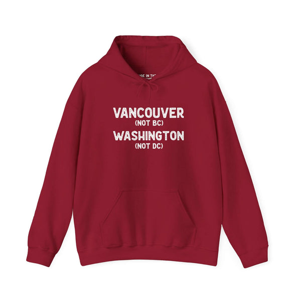 Vancouver Washington hoodie in burgundy, featuring bold text stating 'Vancouver (Not BC) Washington (Not DC)'}